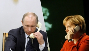 普京与默克尔通电 称干预乌克兰“不可接受”